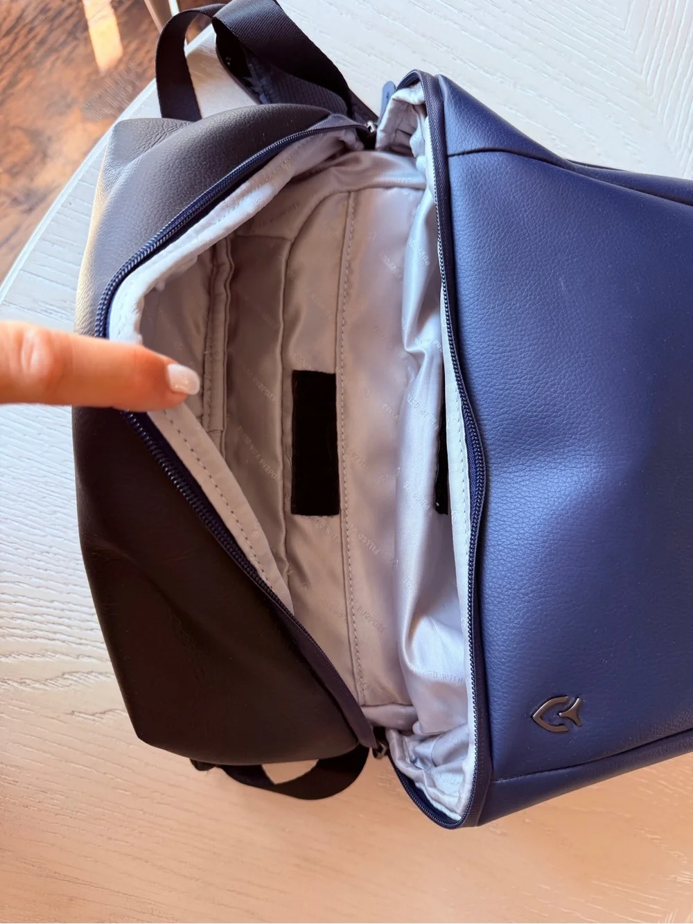 Vessel brand Men's Navy Faux-Leather Backpack with Front Zip Pocket